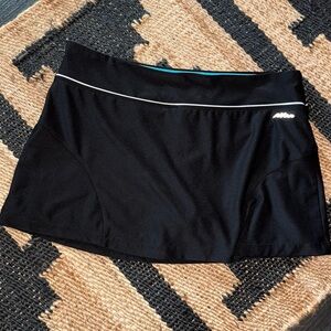 Avia Black Athletic Skort with teal blue shorts. Size Small. Runs big.